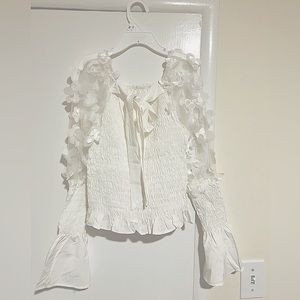 Woman shirt, tight from the Bally